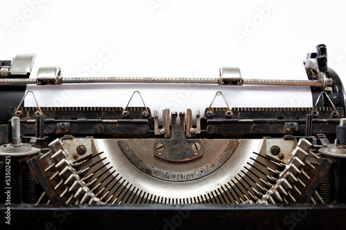 Photo: Old typewriter with a sheet of paper Old typewriter with a sheet of paper
