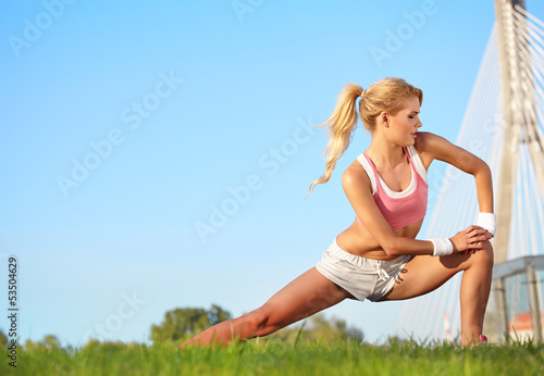 Photo: blond female fitness model outdoors blond female fitness model outdoors