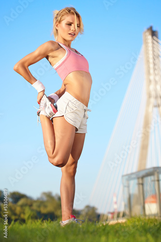 Photo: blond female fitness model outdoors blond female fitness model outdoors