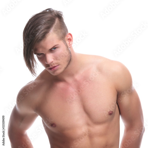 Photo: topless fashion man looks at camera topless fashion man looks at camera