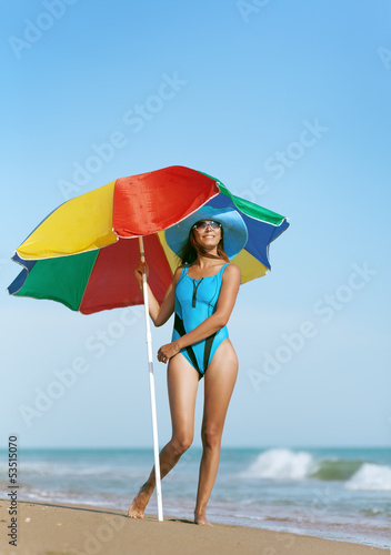 Photo: beauty woman on sea beach beauty woman on sea beach
