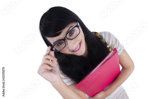 Photo: An isolated shot of beautiful female smiling An isolated shot of beautiful female smiling