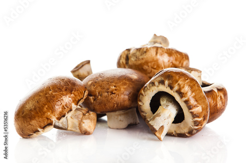 Photo: Fresh mushroom champignon isolated on white background . fresh Fresh mushroom champignon isolated on white background . fresh