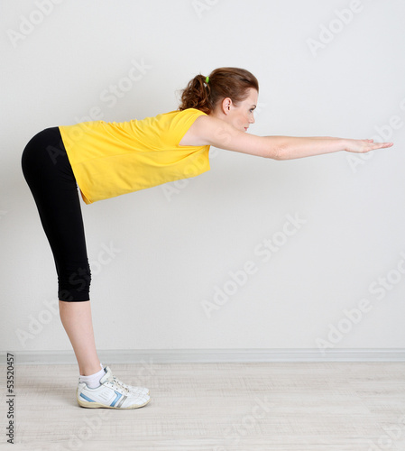 Photo: Portrait of beautiful young woman exercises Portrait of beautiful young woman exercises