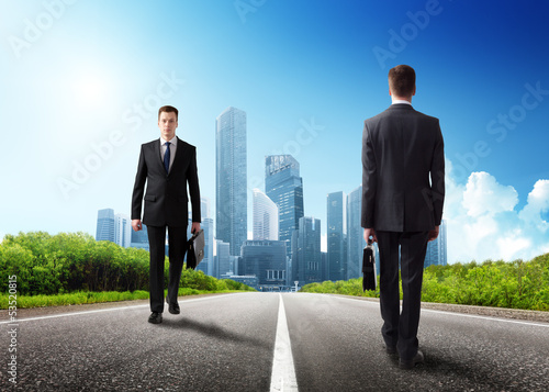 Photo: two business men on the road two business men on the road