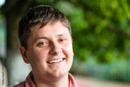 Photo: smiling young man smiling young man