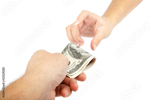 Photo: Hand with money isolated on a white background. Dollar bills. Hand with money isolated on a white background. Dollar bills.