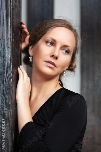 Photo: Beautiful young woman on the porch Beautiful young woman on the porch