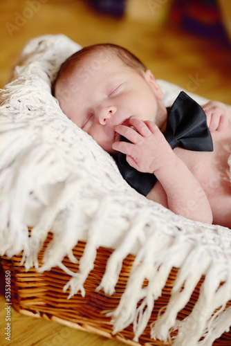 Photo: newborn boy wearing bow tie newborn boy wearing bow tie