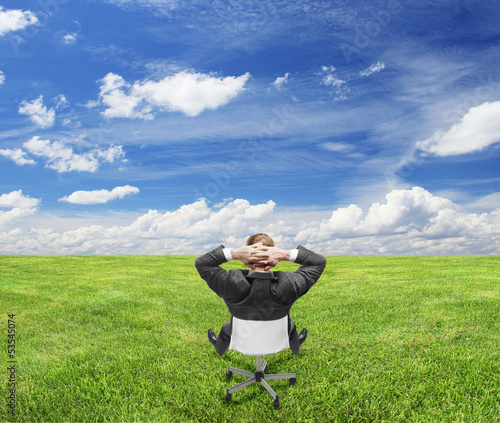 Photo: businnessman sitting on nature businnessman sitting on nature