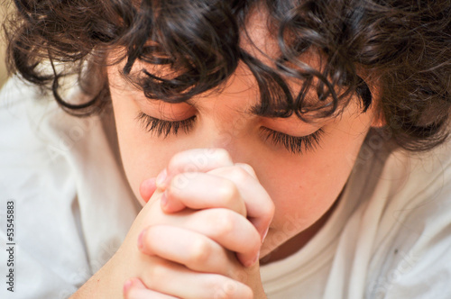 Photo: Hispanic Child in Deep Prayer Hispanic Child in Deep Prayer