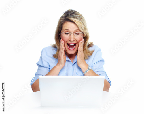 Photo: Happy senior woman with laptop computer. Happy senior woman with laptop computer.