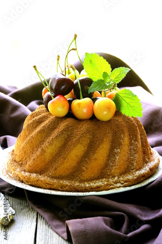Photo: round sponge cake with berries cherry round sponge cake with berries cherry