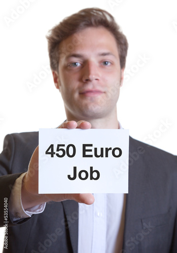 Photo: Junger Mann im Anzug mit Karte 450 EURO JOB Junger Mann im Anzug mit Karte 450 EURO JOB