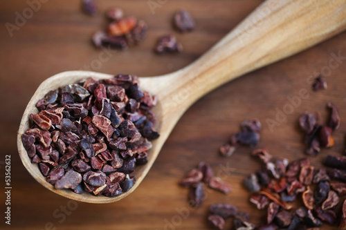 Photo: Cacao raw bean nibs or cocoa crushed and roasted solids Cacao raw bean nibs or cocoa crushed and roasted solids