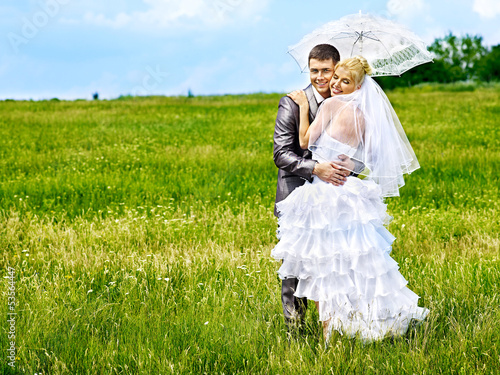 Photo: Bride and groom summer outdoor. Bride and groom summer outdoor.