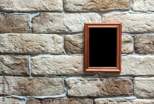 Photo: photo frame on brick wall photo frame on brick wall