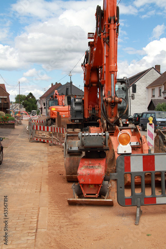 Photo: ein Bagger in der Baustelle ein Bagger in der Baustelle