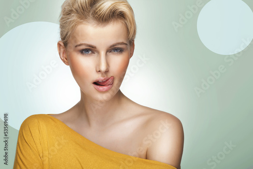 Photo: Young pretty woman with beautiful blond hairs Young pretty woman with beautiful blond hairs