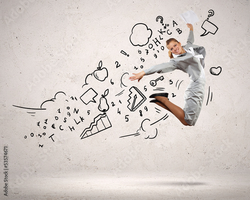 Photo: Businesswoman jumping Businesswoman jumping