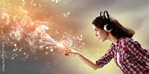 Photo: Young woman with headphones Young woman with headphones