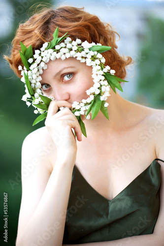 Photo: Portrait of a beautiful redhaired curly female model Portrait of a beautiful redhaired curly female model