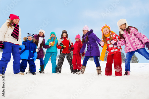 Photo: Large group of kids together on snow day Large group of kids together on snow day