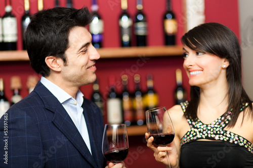 Photo: Young couple at restaurant Young couple at restaurant