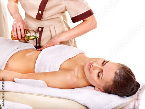 Photo: Woman getting spa therapy outdoor. Woman getting spa therapy outdoor.