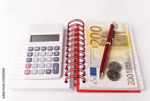 Photo: Money, pen and calculator Money, pen and calculator