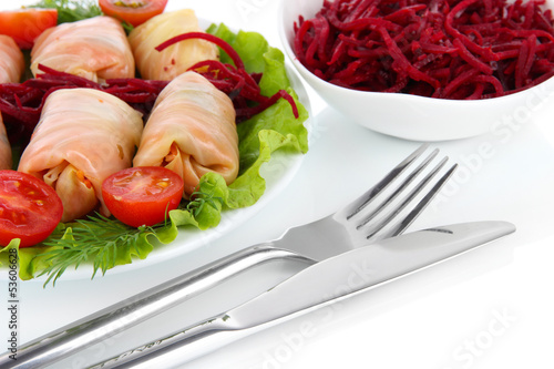 Photo: Stuffed cabbage rolls isolated on white Stuffed cabbage rolls isolated on white