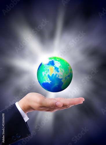 Illustration: earth globe in hand earth globe in hand