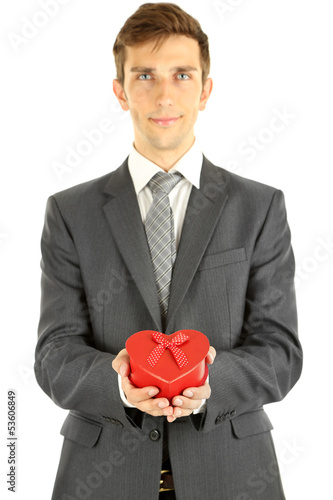 Photo: Young businessman present gift box, isolated on white Young businessman present gift box, isolated on white