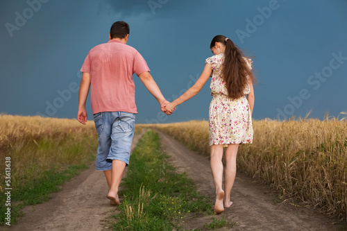 Photo: couple walking the road couple walking the road