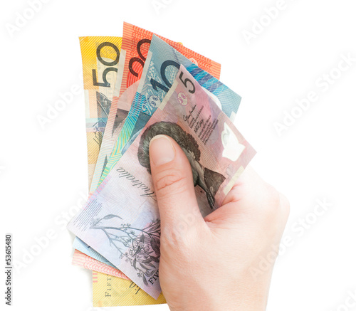 Photo: Hand holding Australian money bank notes Hand holding Australian money bank notes