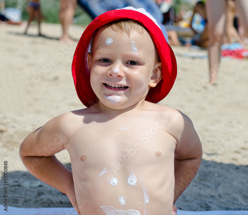 Photo: Happy little boy at the beach Happy little boy at the beach