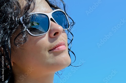 Photo: Beautiful woman enjoying the sun Beautiful woman enjoying the sun