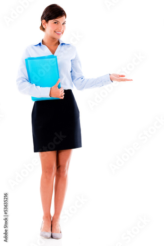 Photo: Business woman showing something Business woman showing something