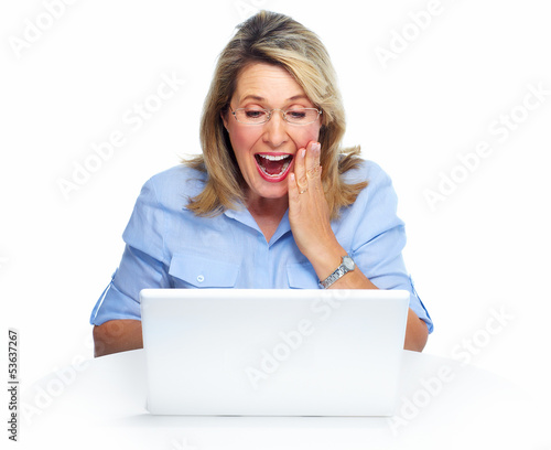 Photo: Happy senior woman with laptop computer. Happy senior woman with laptop computer.
