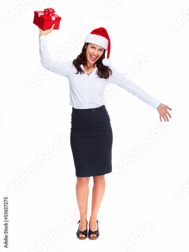 Photo: Santa helper business woman with a present. Santa helper business woman with a present.