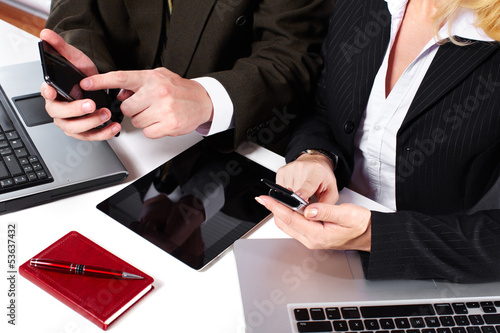 Photo: Business people group working with laptop. Business people group working with laptop.