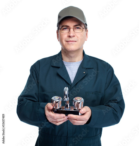 Photo: Plumber with faucet. Plumber with faucet.