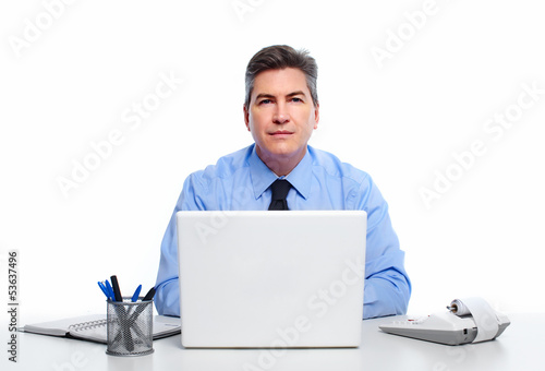 Photo: Businessman with laptop computer. Businessman with laptop computer.