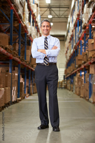 Photo: Portrait Of Manager In Warehouse Portrait Of Manager In Warehouse