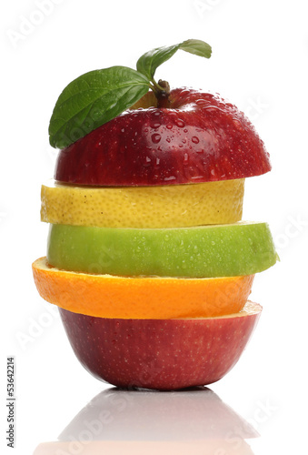 Photo: Colorful pile of fresh fruits over white Colorful pile of fresh fruits over white