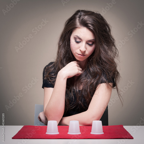 Photo: Young woman making a choice concept. Young woman making a choice concept.