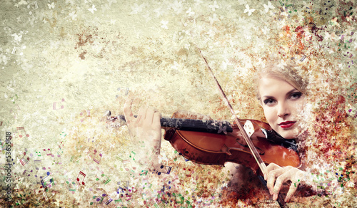Photo: Gorgeous woman playing violin Gorgeous woman playing violin