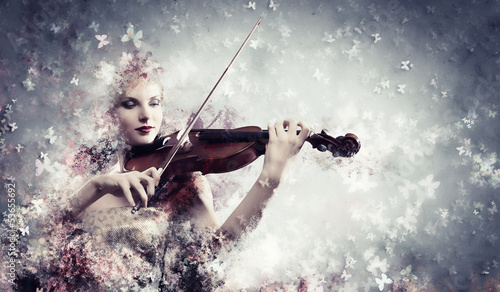 Photo: Gorgeous woman playing violin Gorgeous woman playing violin