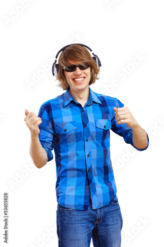 Photo: Happy smiling young man dancing Happy smiling young man dancing