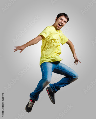 Photo: Young man dancing and jumping Young man dancing and jumping